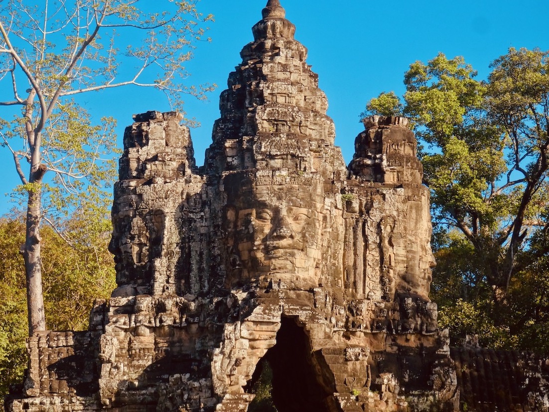 Carved faces Bayon Temple Angkor Siem Reap Cambodia.