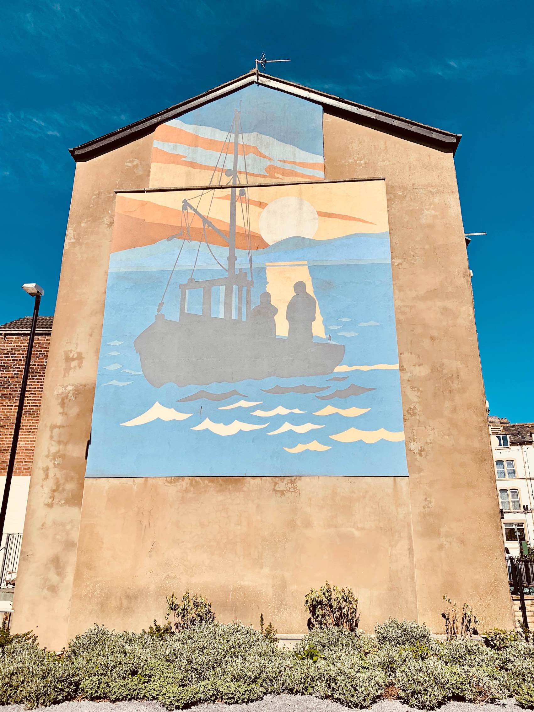 Fishing boat at sunset mural in Morecambe