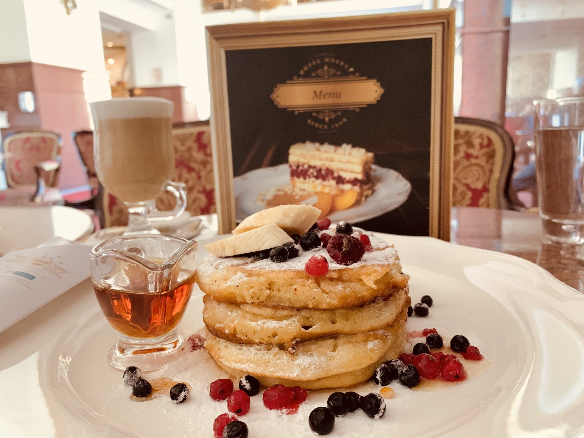 American pancakes with fruits and maple syrup at Hotel Moskva Belgrade