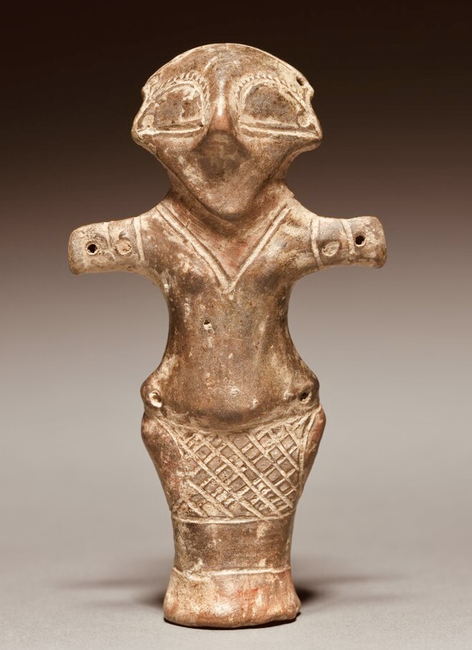An ancient clay statuette made by the Vinča culture