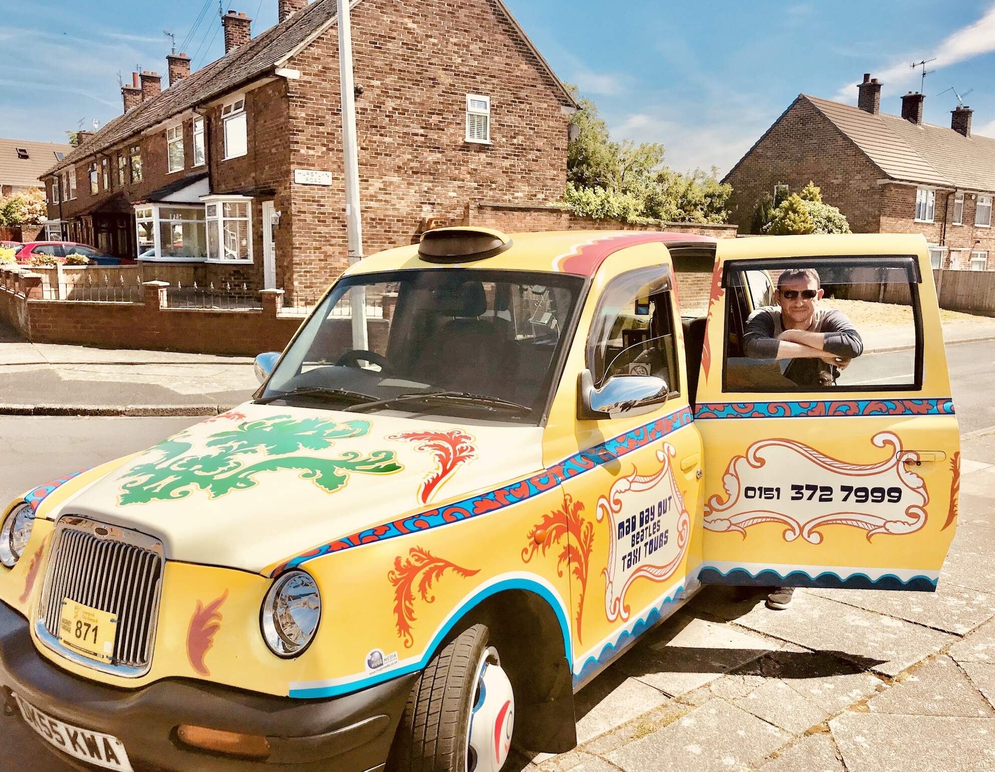 Experiencing the Mad Day Out Beatles Taxi Tour in Liverpool