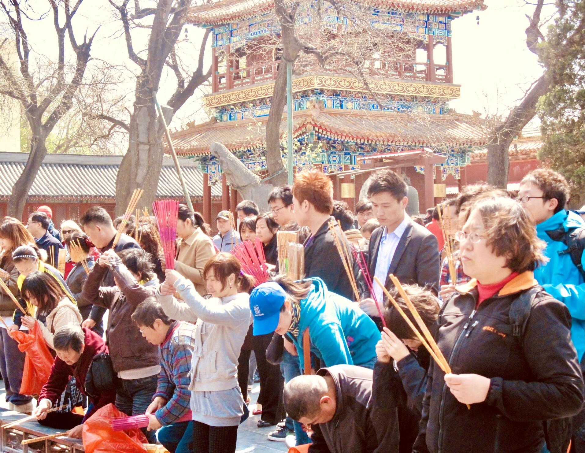 Worshippers at Beijing's Lama Temple.